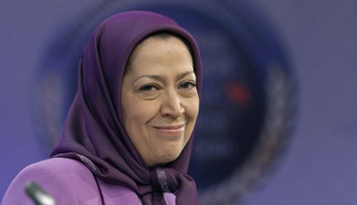 
              FILE - In this Jan. 25, 2011 file photo, Maryam Rajavi, President-elect of Iranian opposition party National Council of Resistance of Iran, smiles as she attends an international confer